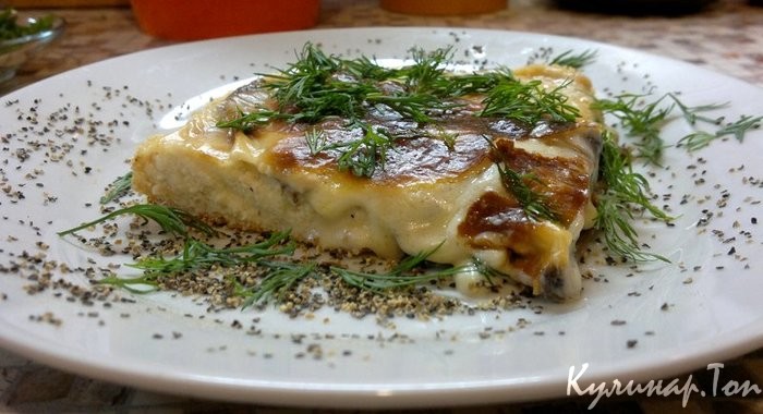 Рыбная запеканка с грибами под соусом бешамель
