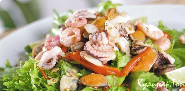 Закуска теплая из морского коктейля с грибами и ветчиной Закуска теплая из морского коктейля с грибами и ветчиной