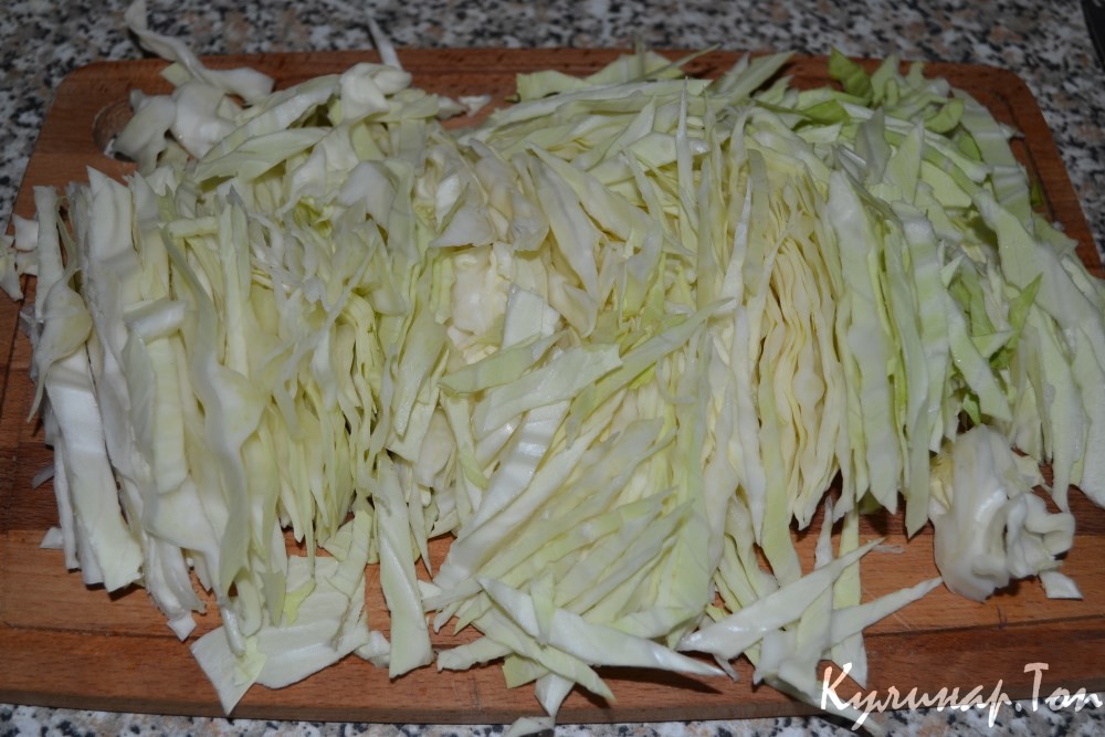 Тушеная капуста с куриными сердечками